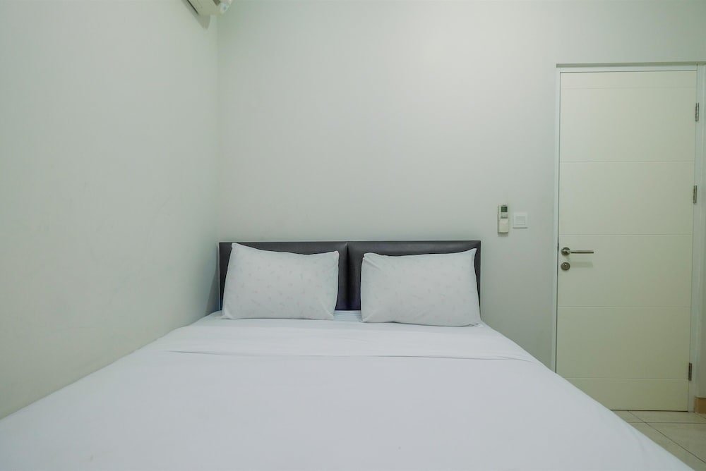 Standard room 2BR Apartment with Minimalist Style at Springlake Summarecon