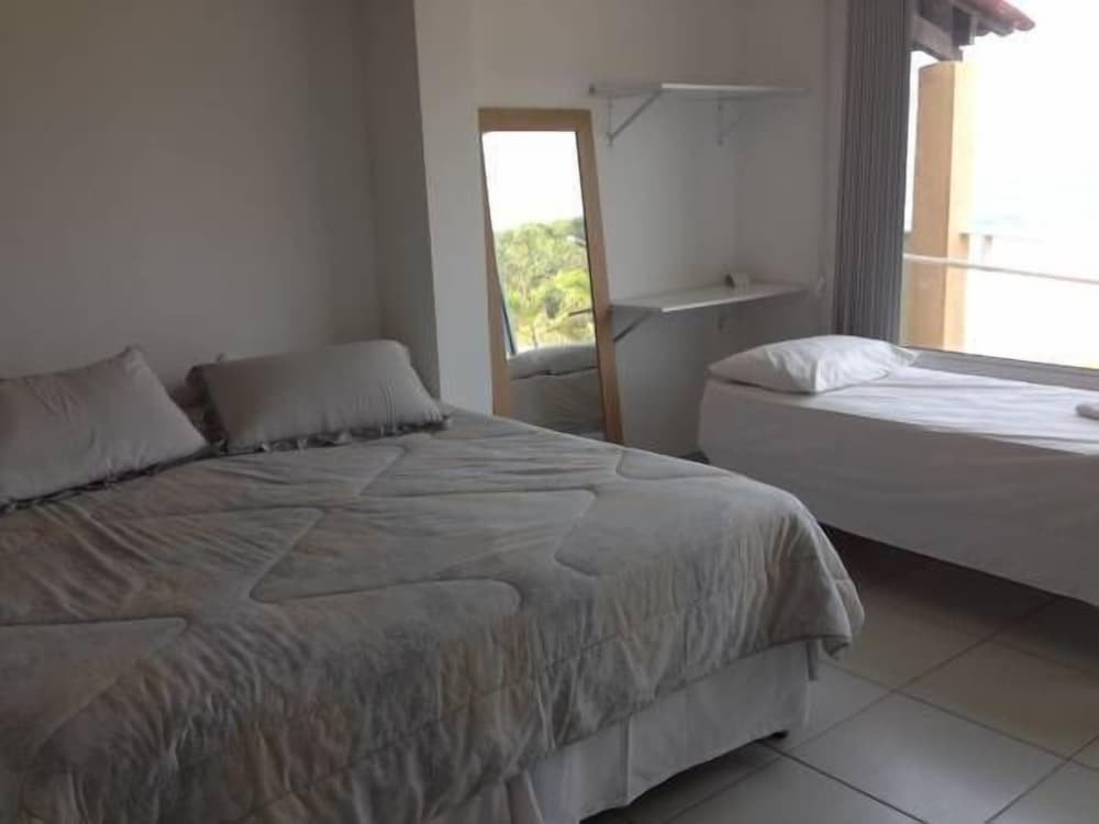 Cama en dormitorio compartido frente a la playa Mirante Hostel Recife