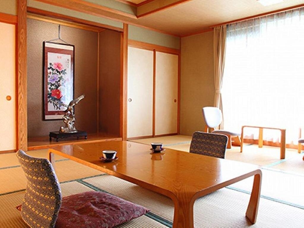 Четырёхместный номер Standard Hotel Hoshikawakan