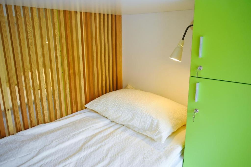 Кровать в общем номере Youth Hostel Ajdovscina