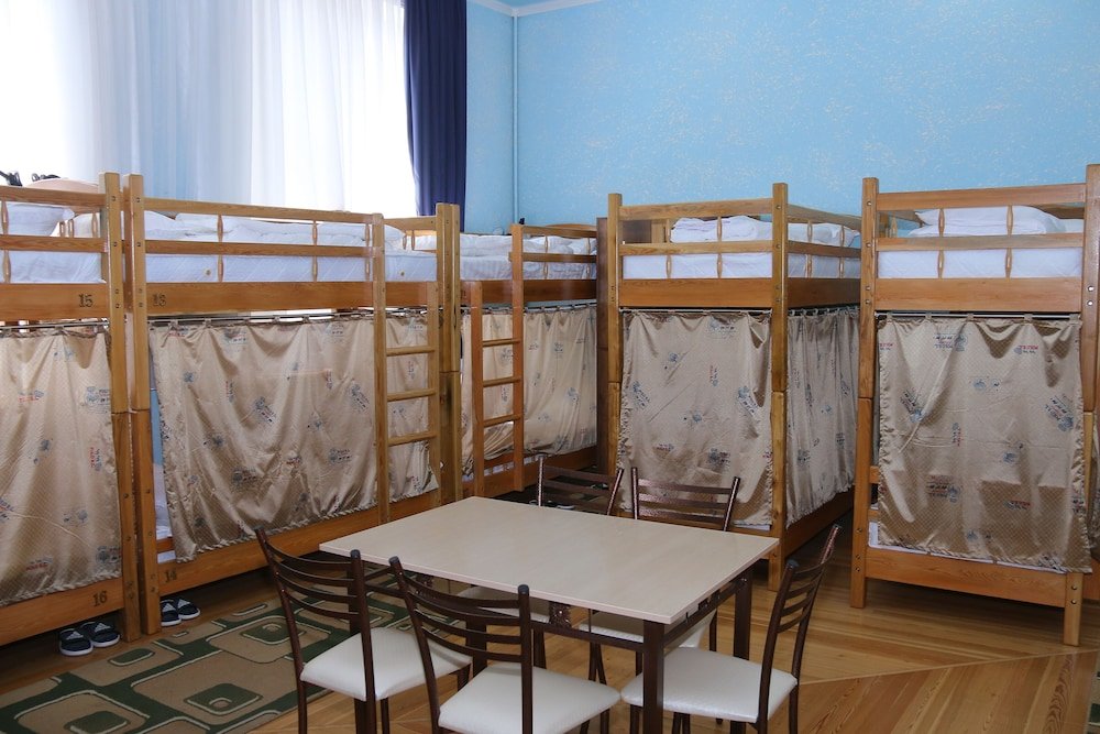 Кровать в общем номере Rakat Hostel