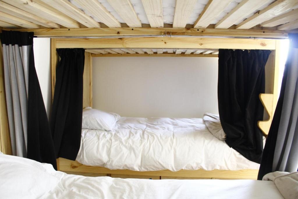 Cama en dormitorio compartido Casa Kila Hostel