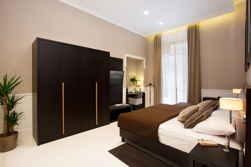 Suite familiare con balcone Nap Luxury Guest House