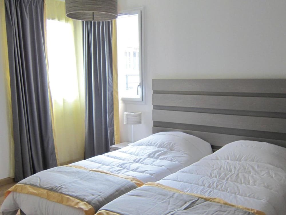 Кровать в общем номере Дуплекс с 2 комнатами Lagrange Vacances Les Patios Eugénie