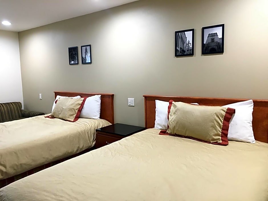 Standard Quadruple room Simply Home Inn & Suites - Riverside