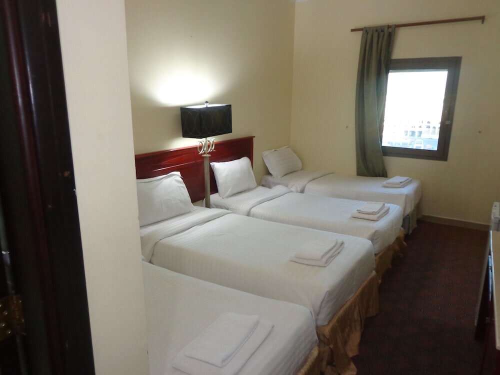 Standard Quadruple room Ishraq Al Bustan Hotel