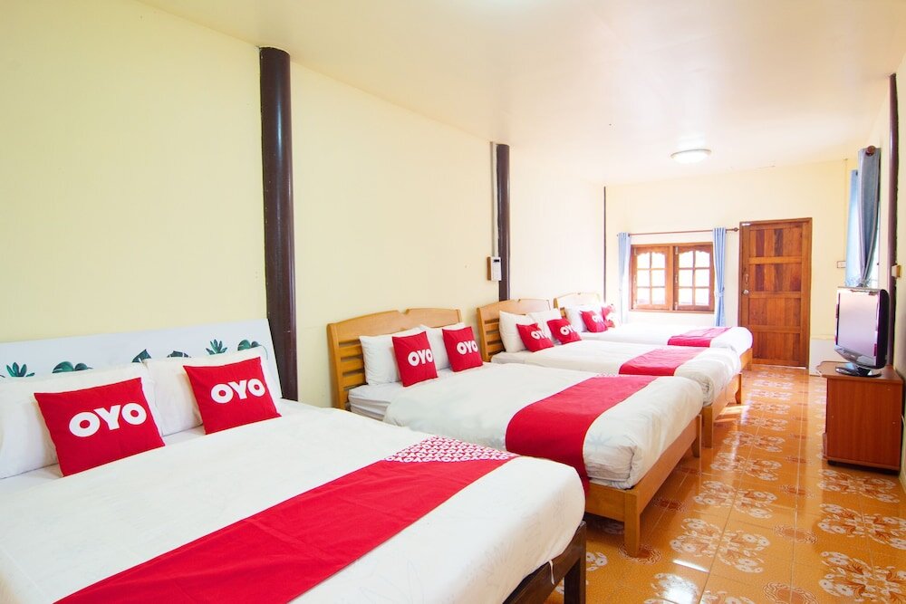 Кровать в общем номере OYO Garfield Resort Pranburi