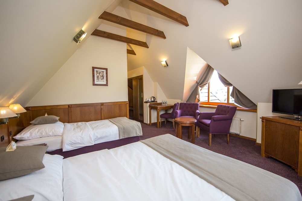 Camera tripla Premium con balcone e con vista sulle montagne Hotel REDYK Ski&Relax