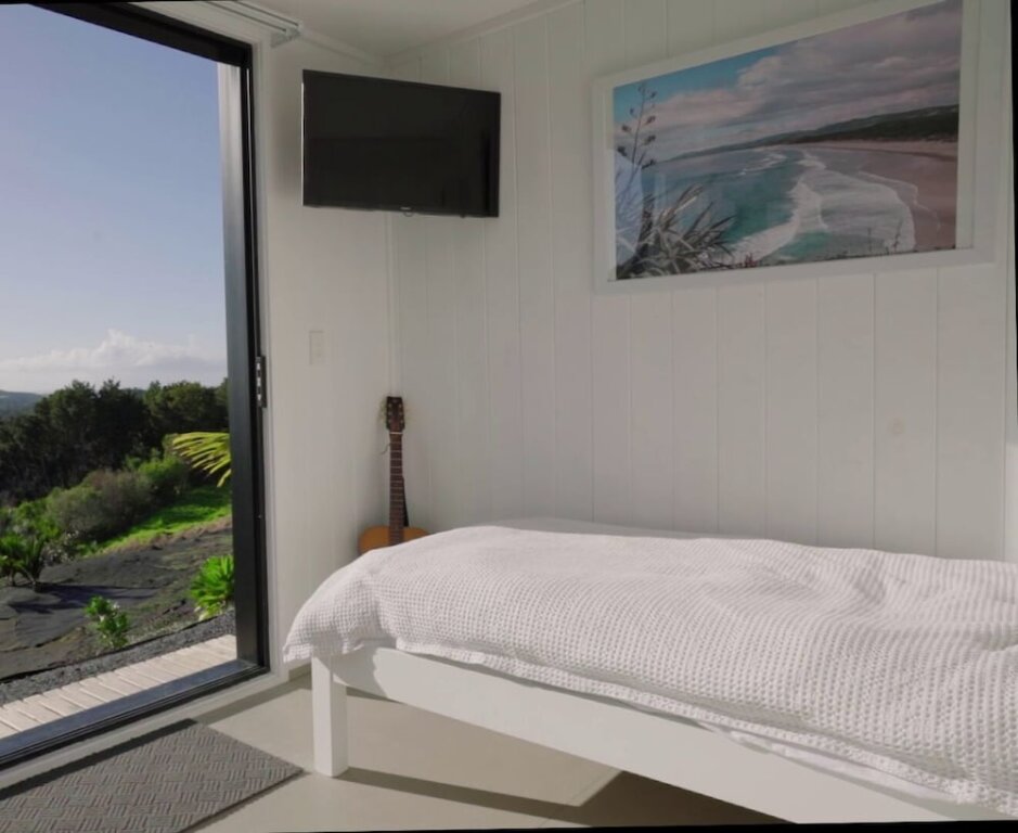 Habitación cuádruple familiar Estándar con vista al océano Aotearoa Surf Eco Pods
