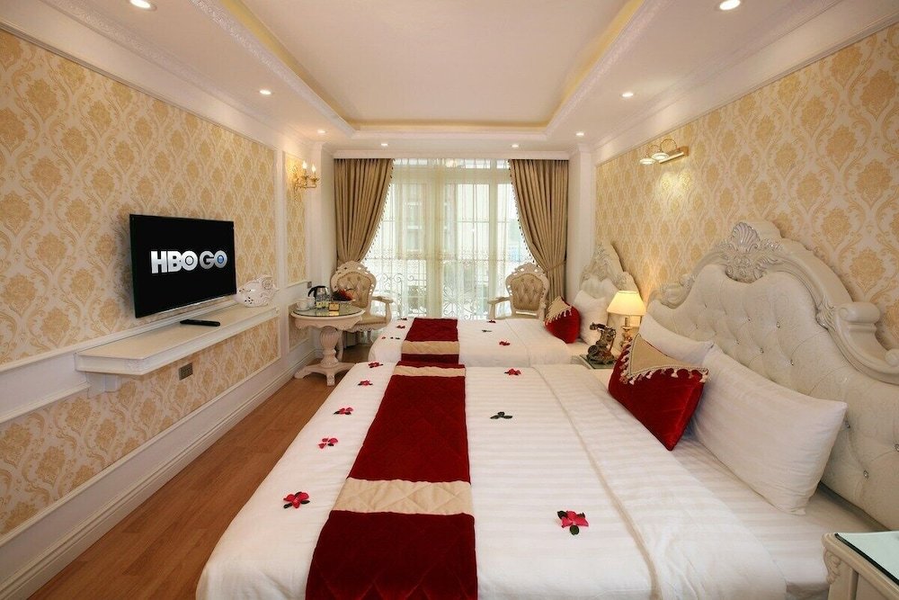 Habitación cuádruple De lujo Hanoi Hotel Royal