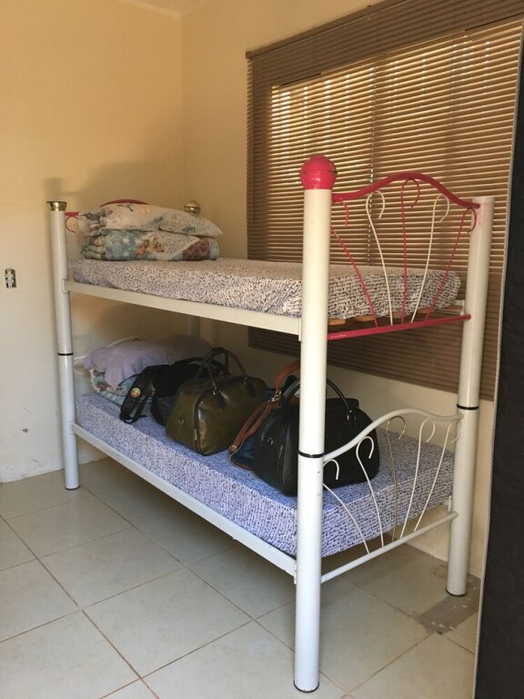 Cama en dormitorio compartido Brasilia - Casa de temporada