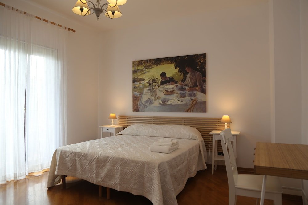 Comfort Quadruple room with garden view Il Grandangolo