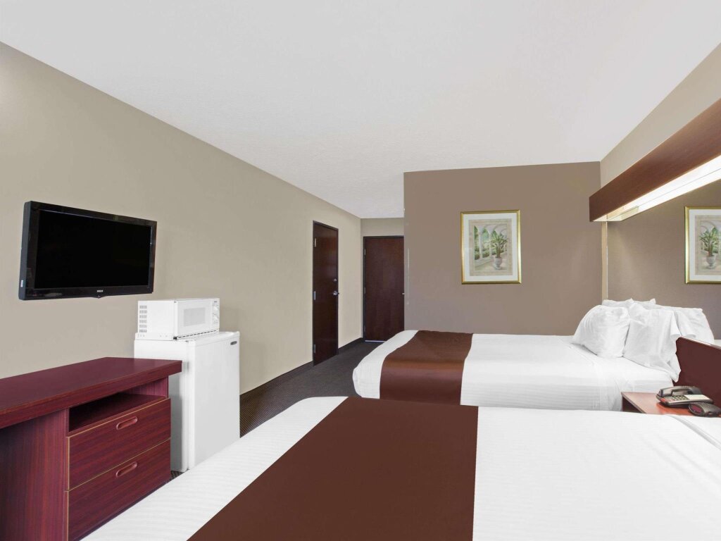 Bett im Wohnheim Microtel Inn & Suites by Wyndham Meridian