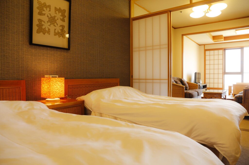Кровать в общем номере Yumekaiyu Awajishima