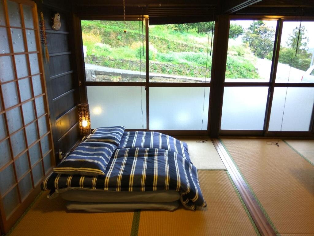 Habitación triple Estándar con vista al jardín Kumano Kodo Nagano Guesthouse