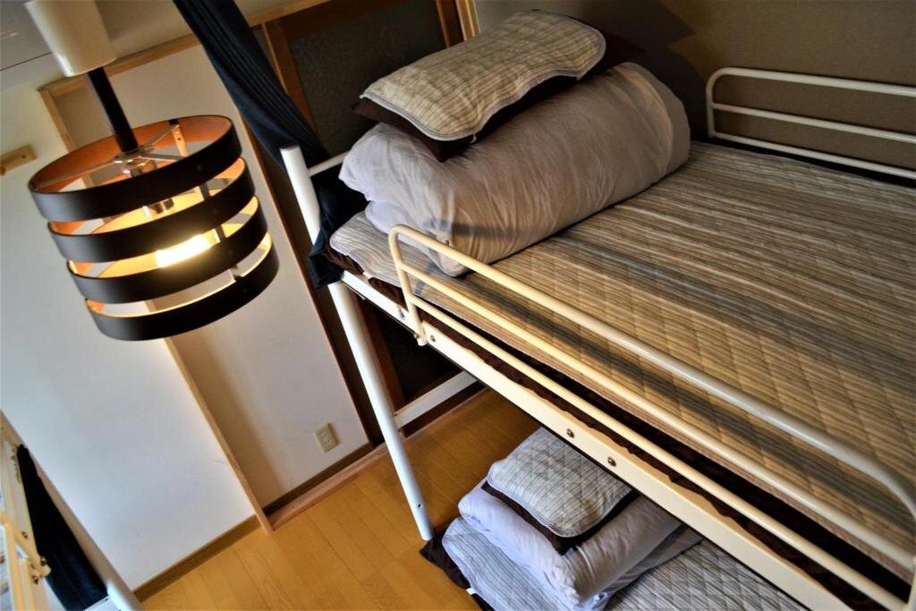 Кровать в общем номере (женский номер) Peace house Abeno
