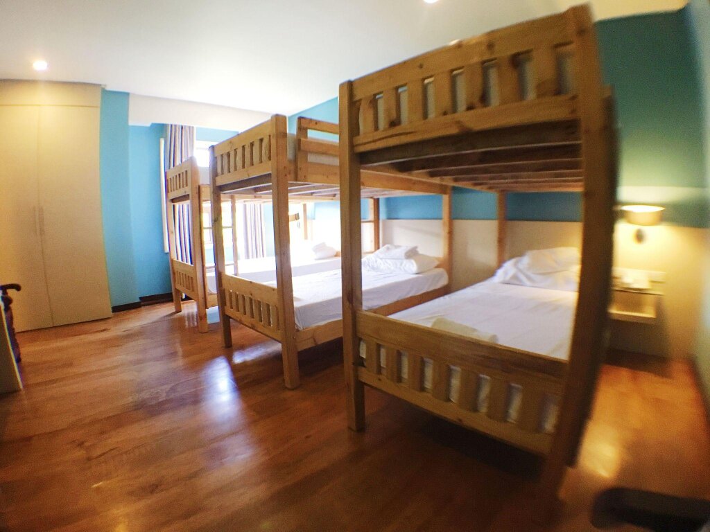 Кровать в общем номере Ciudad Fernandina Hotel