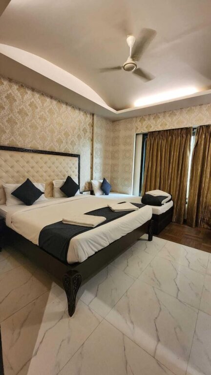 Deluxe triple chambre Hotel Sai Dharam Palace Shirdi