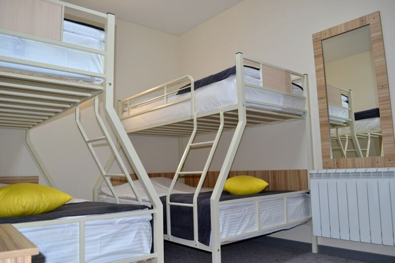 Cama en dormitorio compartido Hotel Olimpik