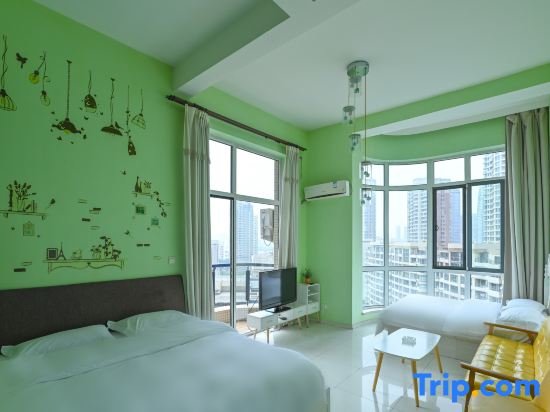 Кровать в общем номере Дуплекс с видом на море Guanhai Apartment Hotel