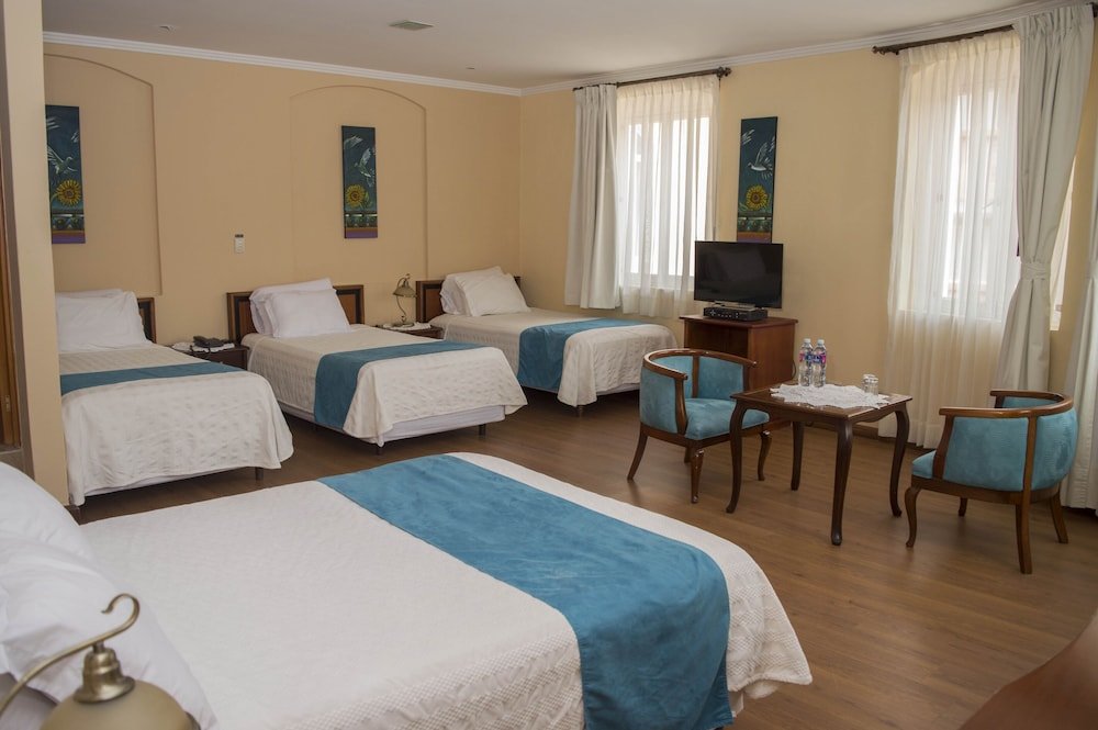 Standard Quadruple room with balcony Hotel La Casona