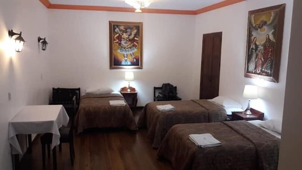Кровать в общем номере Monasterio de Q'era - Hostel