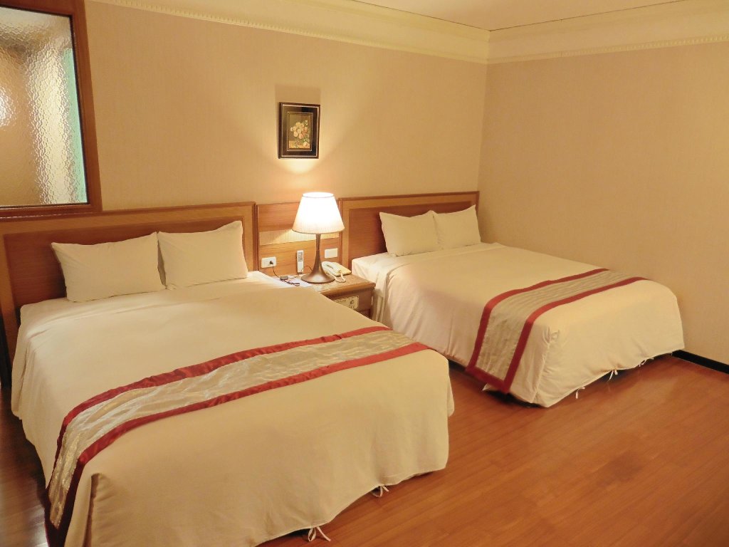 Standard quadruple chambre Tapeng Bay Holiday Hotel