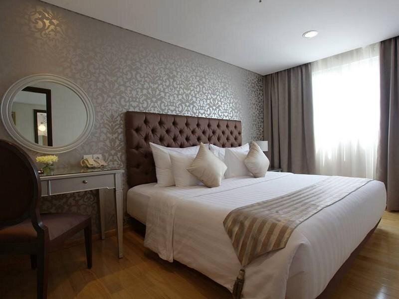 Семейный люкс с 3 комнатами MG Suites Maven Semarang