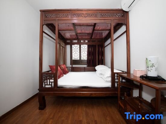 Кровать в общем номере Shaoxing Dayue Xiaoyuan Culture Theme Hotel