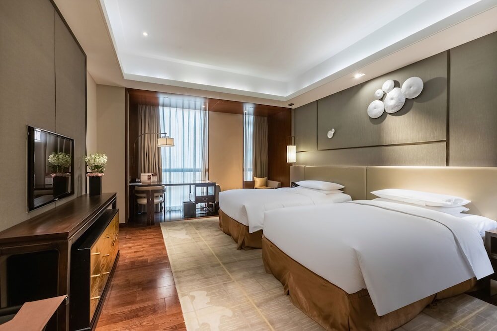 Четырёхместный номер Premium HUALUXE Wuxi Taihu, an IHG Hotel