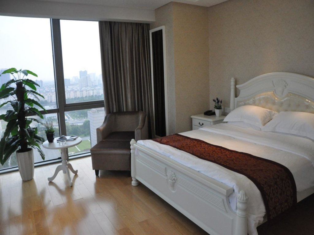 Люкс Deluxe Puyu Zhongrun Apartment Hotel