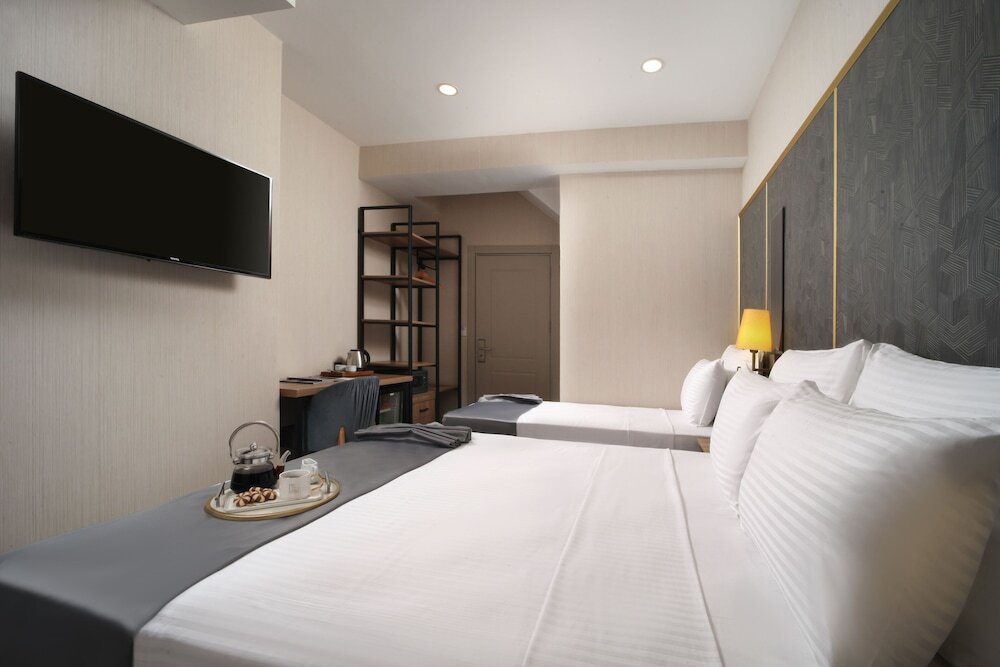 Standard Triple Basement room Imagine Hotel