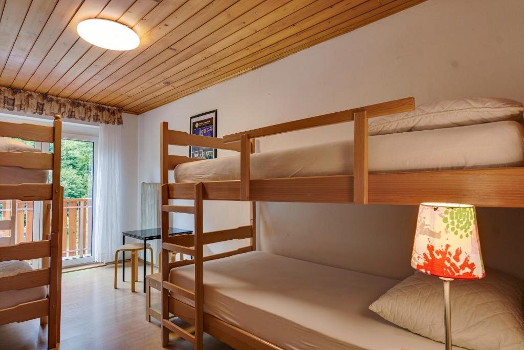 Кровать в общем номере Rooms Pevc & Hostel Ljubno ob Savinji