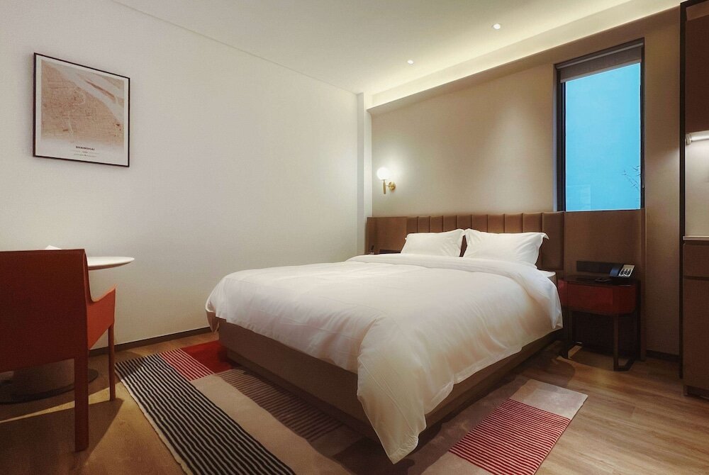Deluxe chambre Ramada Encore by Wyndham Shanghai Pudong Airport