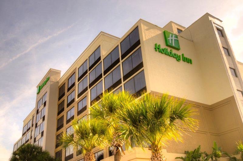 Кровать в общем номере Holiday Inn Orlando East-UCF Area, an IHG Hotel