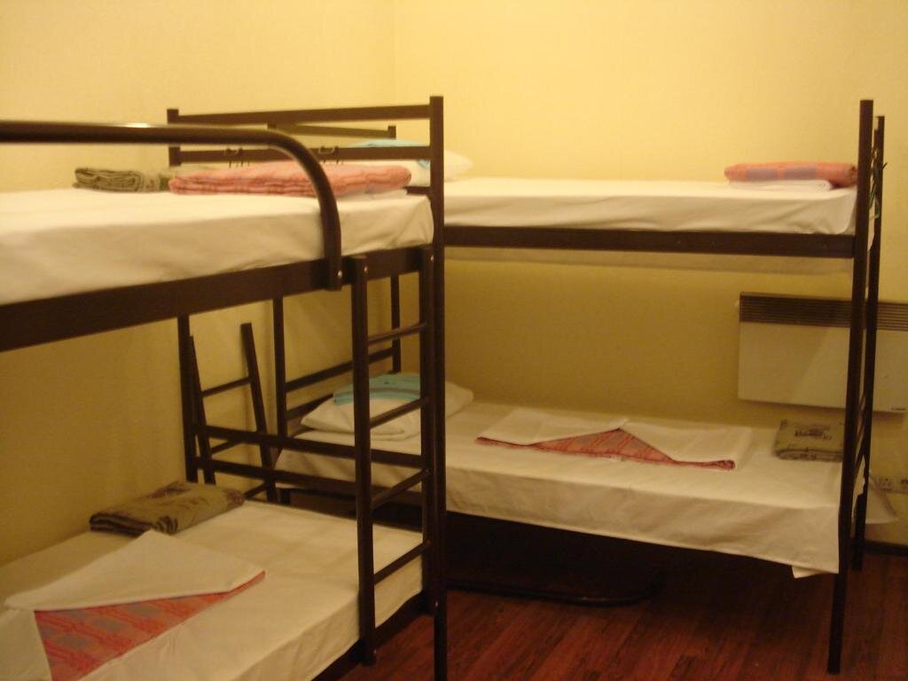 Кровать в общем номере Хостел «Вояж»