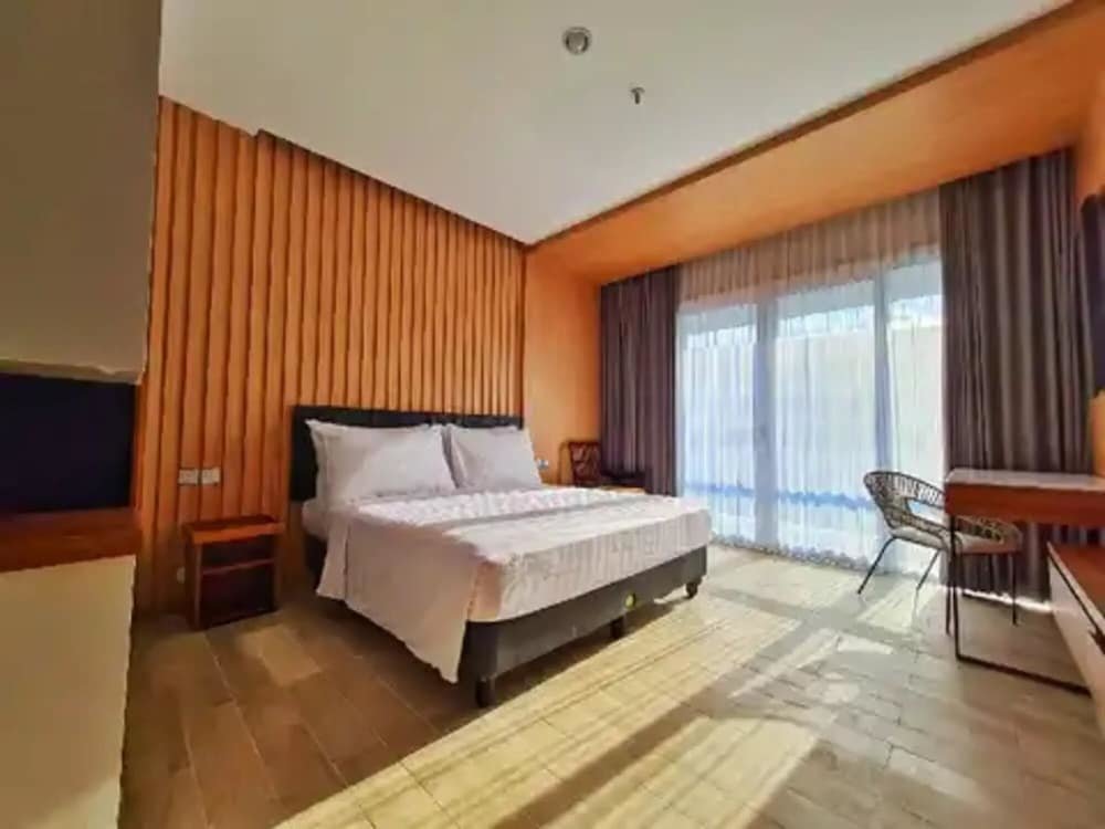 Deluxe chambre Raja Hotel Kuta Mandalika Powered