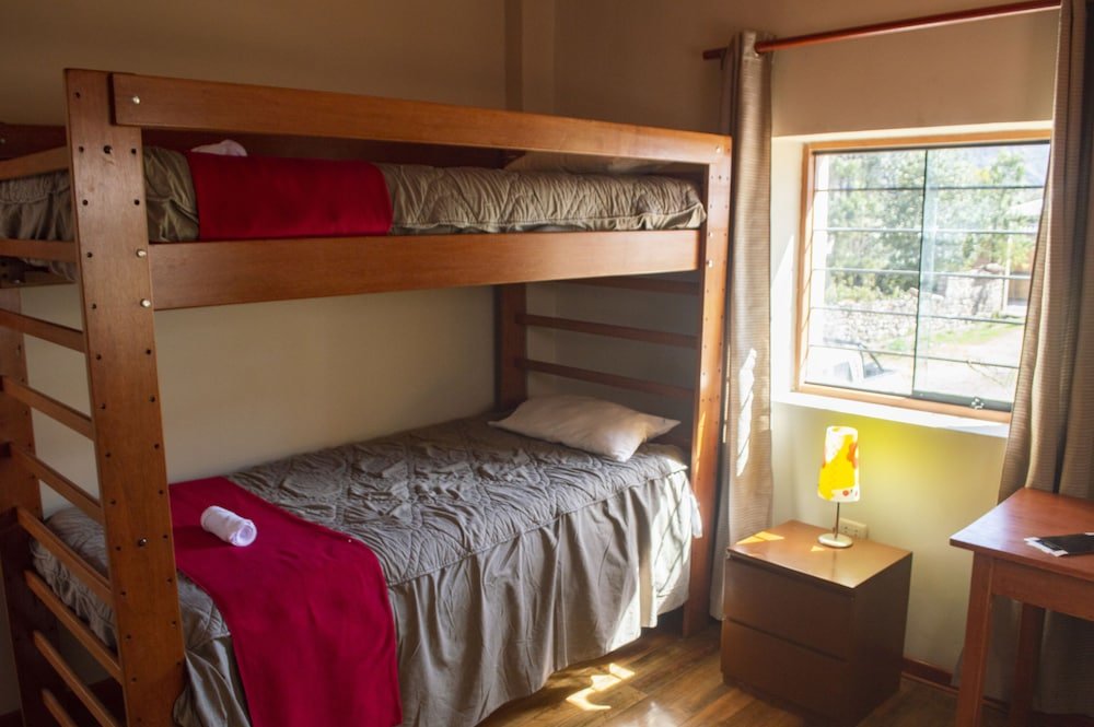 Cama en dormitorio compartido Pirwa Urubamba Eco Hostel