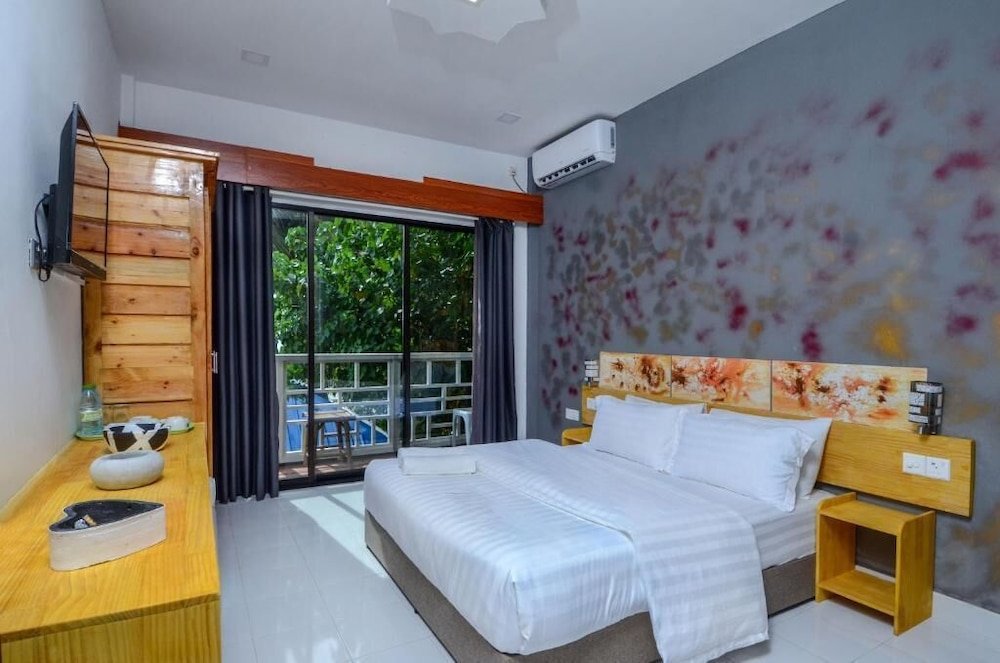Premier chambre Paradise Retreat, Maafushi