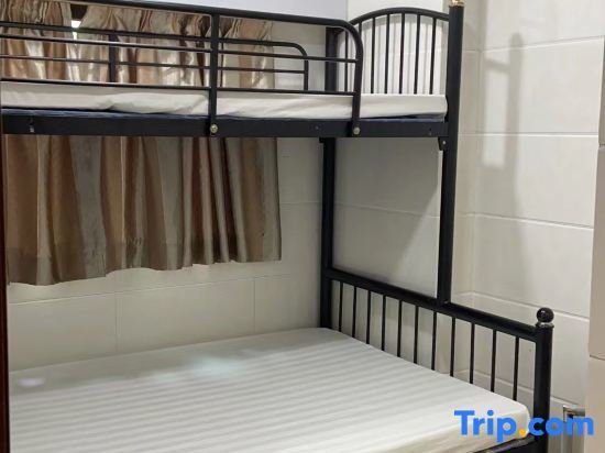 Cama en dormitorio compartido Yi Jia Hotel