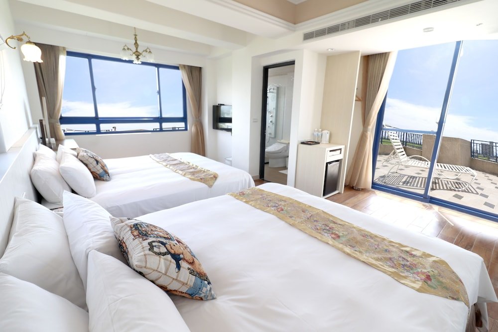 Deluxe Quadruple room with ocean view Zen Ocean