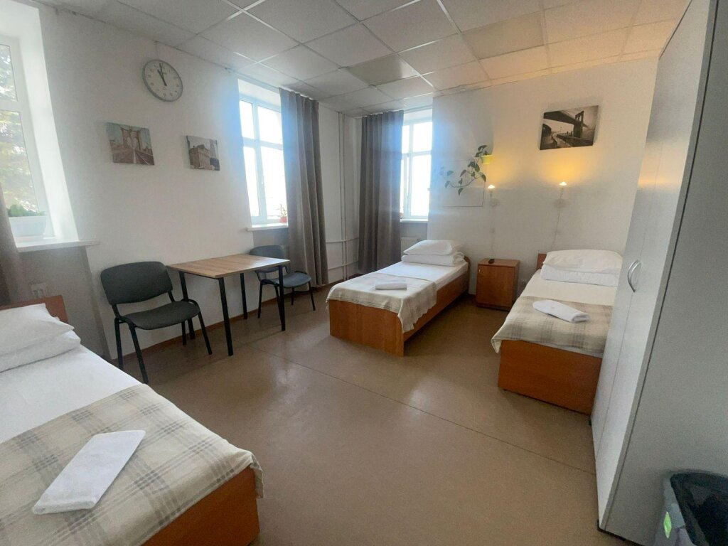 Кровать в общем номере Smart Hotel КДО Петрозаводск