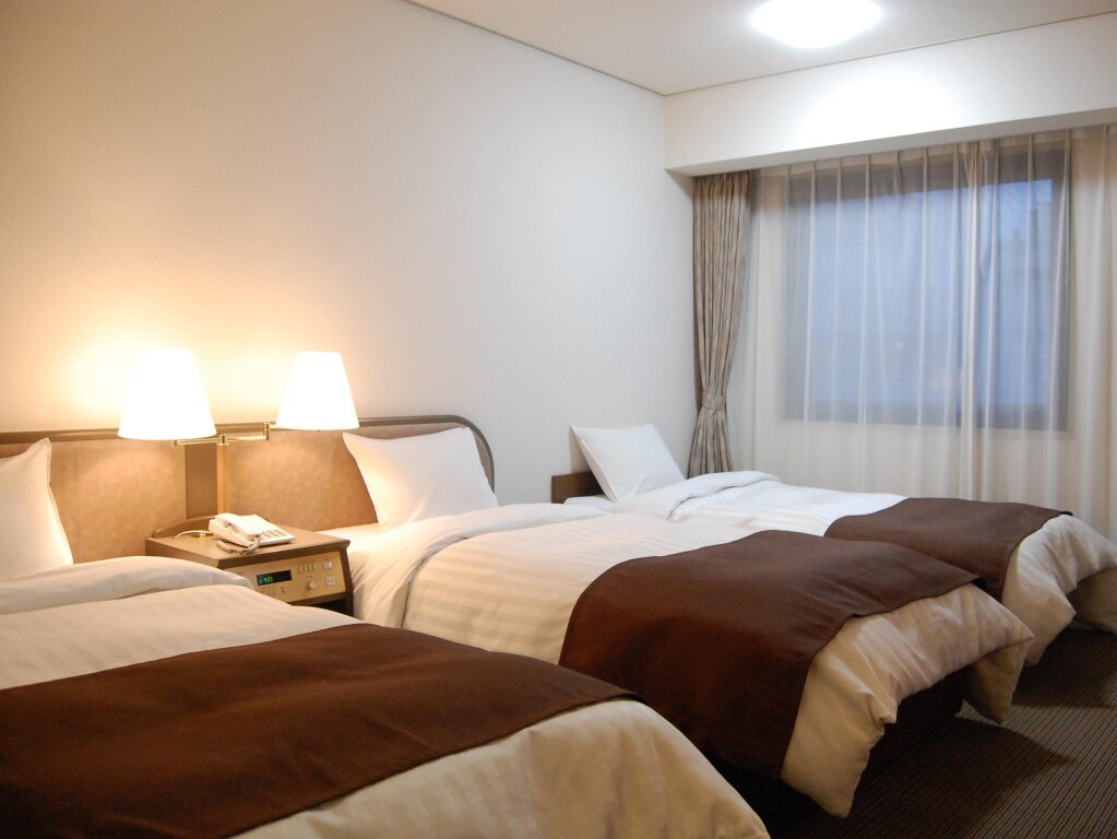 Standard triple chambre Hotel Sunroute Aomori