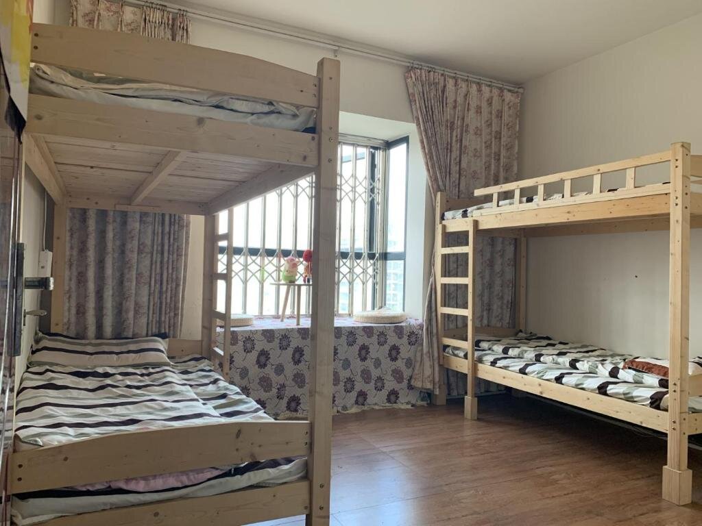 Кровать в общем номере (женский номер) ZaijianJianghu Youth Hostel
