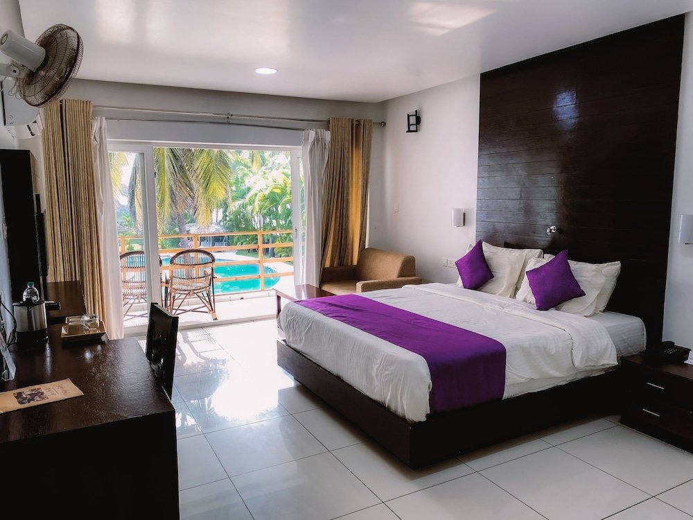 Номер Premier с красивым видом из окна Malabar Ocean Front Resort & Spa