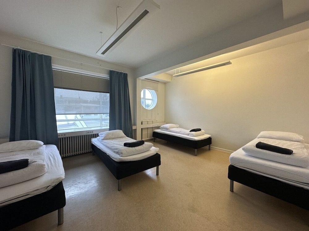 Standard Vierer Zimmer mit Stadtblick Baron's Hostel
