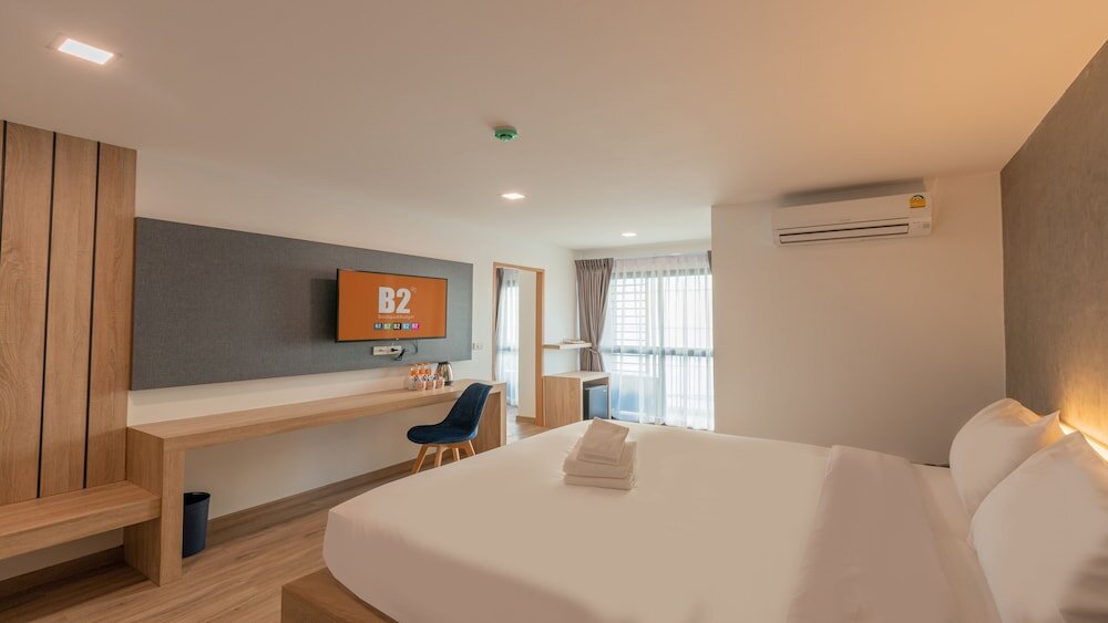 Luxe triple chambre avec balcon B2 Huai Khwang Premier Hotel