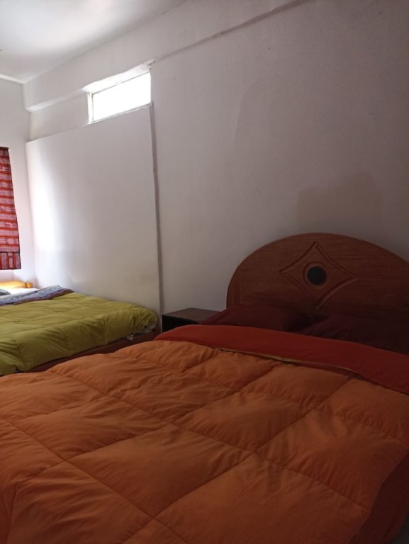 Classic Quadruple room Adrianos Hotel Cusco