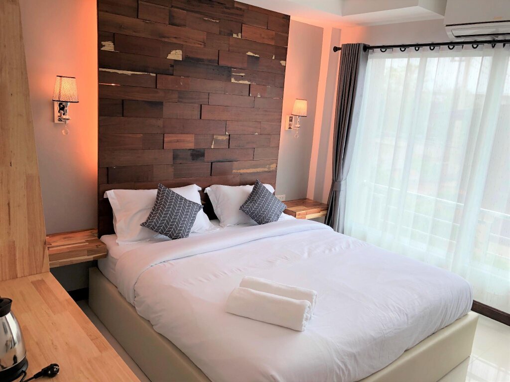 Кровать в общем номере Nan Panwa Hotel