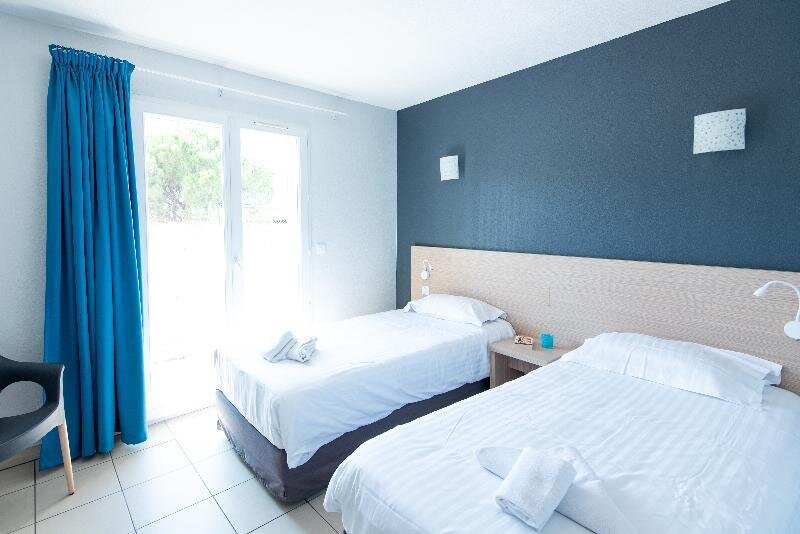 Cama en dormitorio compartido 3 habitaciones Zenitude Hôtel-Résidences La Tour de Mare